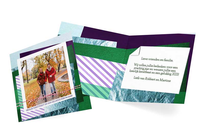 Kerstkaart met foto en laagjes gekleurd papier