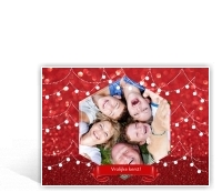 Vrolijke kerstkaart met foto in zeshoekig kader en rode bokeh achtergrond